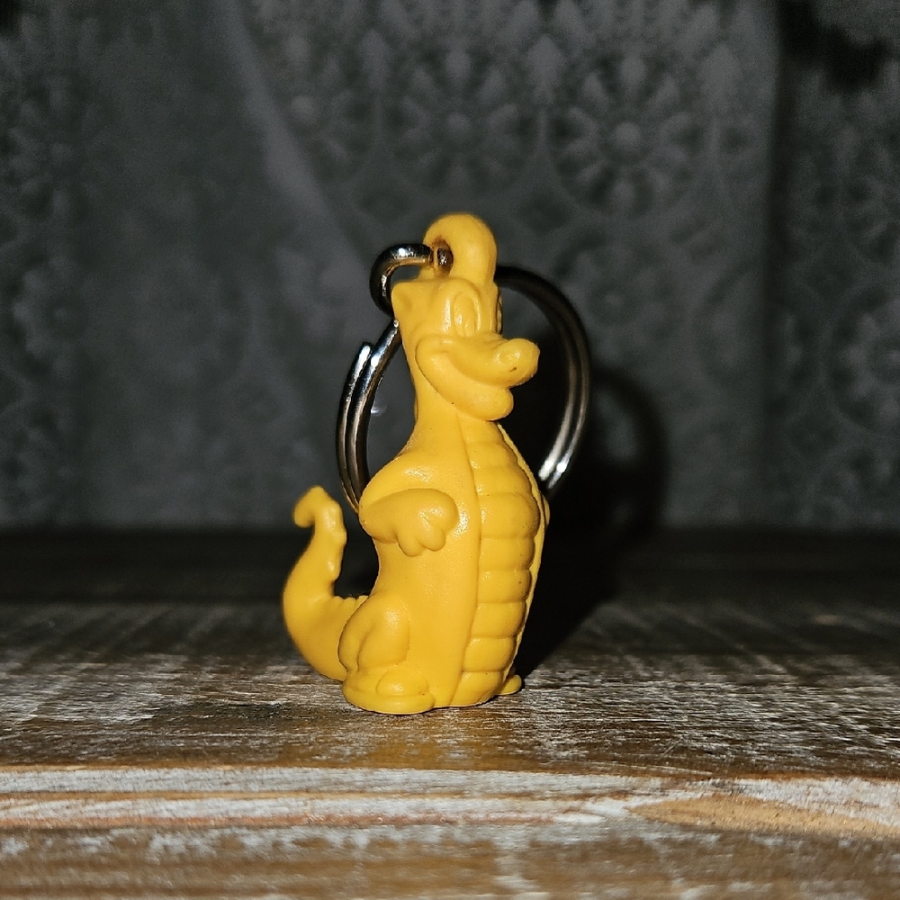 Vintage | 90's Tupperware Yellow Douglas Dirtwalker Keychain